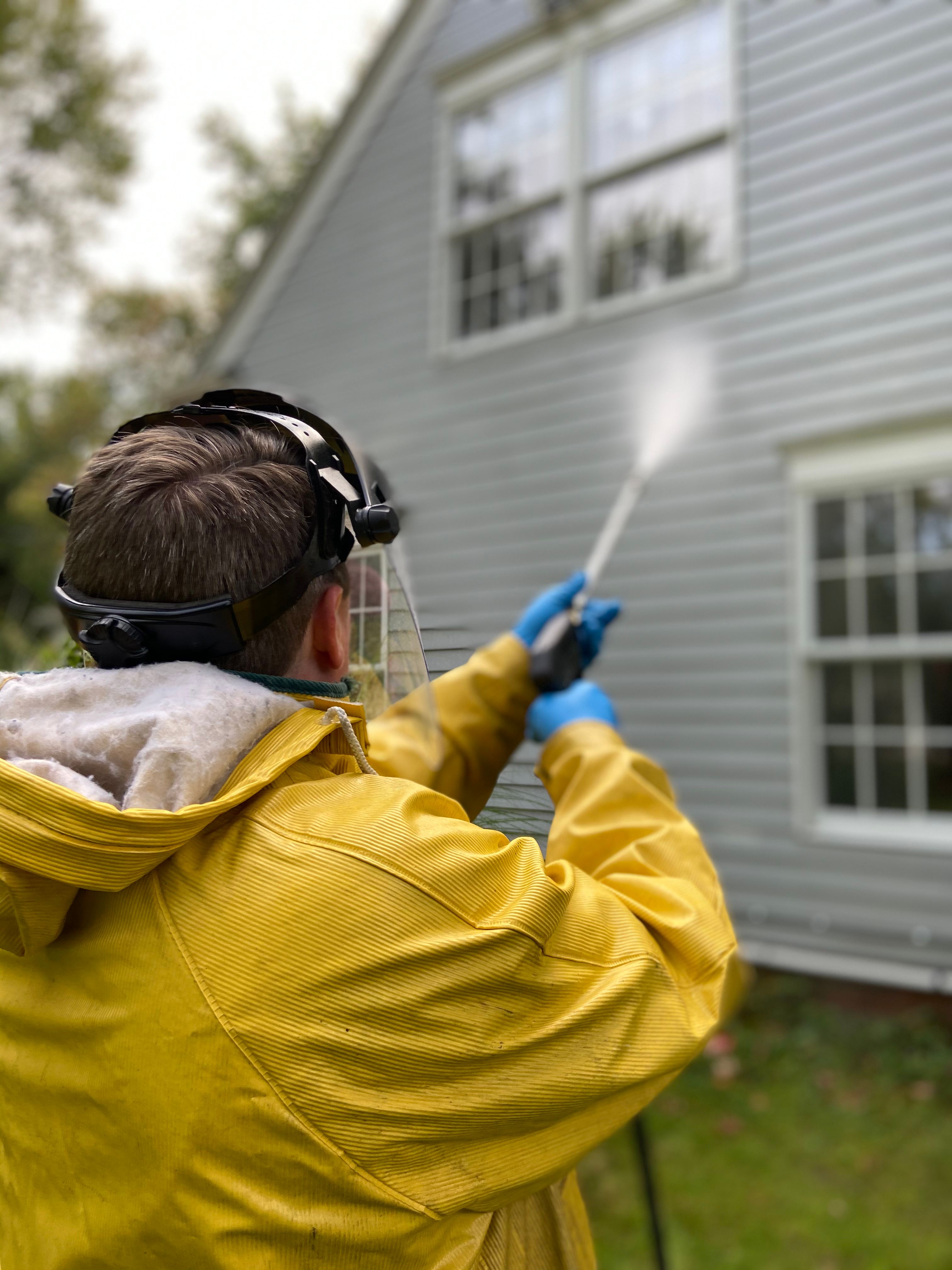 Exterior cleaning specialist washing residential siding